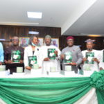 L-R: National Commissioners, Dr Adekunle Ogunmola, Prof. Okechukwu Ibeanu, Mrs. May Agbamuche-Mbu, INEC Chairman, Prof. Mahmood Yakubu, National Commissioners Festus Okoye, Ahmed Mua’zu and Mohammed Haruna, at the unveiling of 56,872 Polling Units in Abuja on Wednesday 16th June 2021. PHOTO: BASIL NWAGUGU