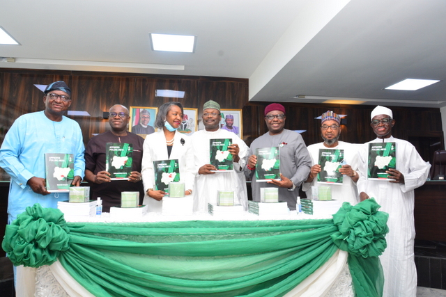 L-R: National Commissioners, Dr Adekunle Ogunmola, Prof. Okechukwu Ibeanu, Mrs. May Agbamuche-Mbu, INEC Chairman, Prof. Mahmood Yakubu, National Commissioners Festus Okoye, Ahmed Mua’zu and Mohammed Haruna, at the unveiling of 56,872 Polling Units in Abuja on Wednesday 16th June 2021. PHOTO: BASIL NWAGUGU