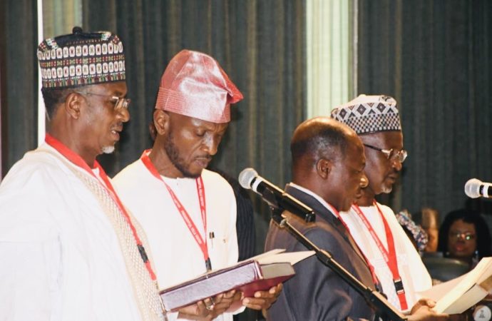 INEC Hopeful of New Electoral Act as Tinubu Swears in Two Commissioners